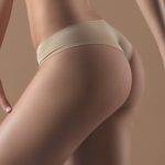 Woman Butt Closeup In Nude Color Panties
